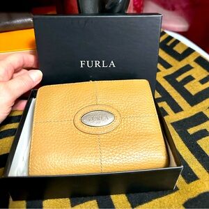 Furla wallet with tissue and box. In excellent condition.